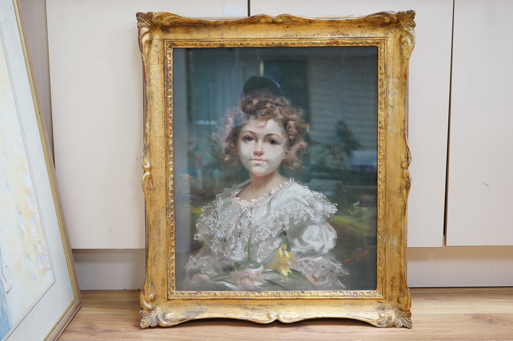 Leon John Sprinck (1866-1948), pastel on canvas, Head and shoulders portrait of a young girl, signed, 59 x 49cm, ornate gilt framed. Condition - good